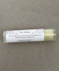 Vanilla Mint Olive Oil Lip Balm tube showing ingredients label listing beeswax, coconut oil, olive oil, mango butter, vanilla mint flavor, and vitamin E oil