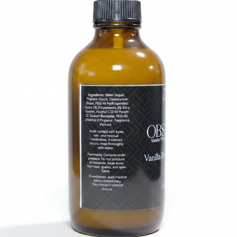 Obsidian Room Spray amber glass bottle showing ingredients label on the back