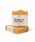 Walking on Sunshine Handcrafted Soap bars with kraft paper labels, boxed and unboxed, on a white background