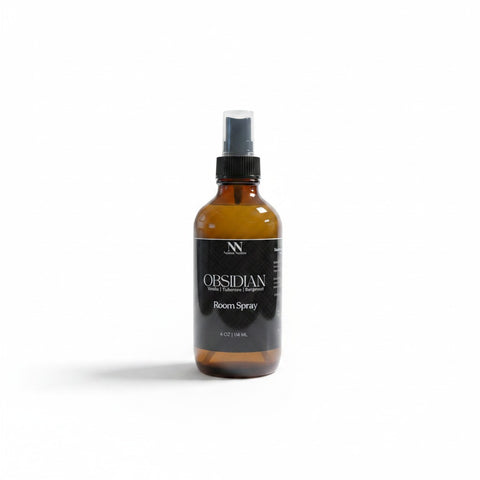 Obsidian Room Spray amber glass bottle with black label on a white background