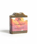 Tuscan Sunset Tallow Soap bar with sunset-toned label on a white background