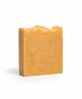 Walking on Sunshine Handcrafted Soap bar in golden orange-peach tones on a white background