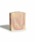 Lavender Dreamin' Handcrafted Vegan Soap bar with pink and beige swirled marbling on a white background
