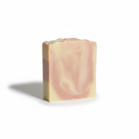 Lavender Dreamin' Handcrafted Vegan Soap bar with pink and beige swirled marbling on a white background