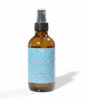 Serenity Essential Oil Room Spray bottle with soft shadow on a white background