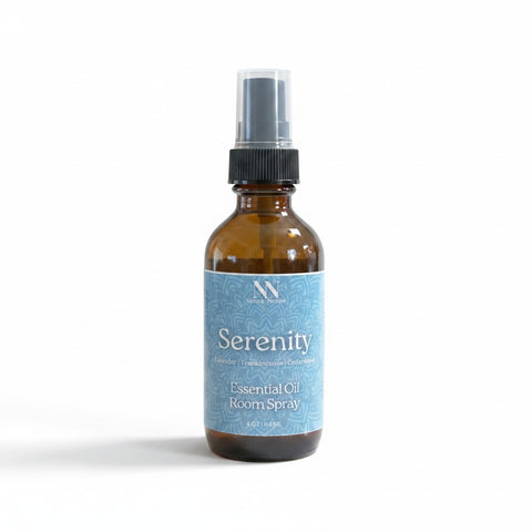 Serenity Essential Oil Room Spray amber glass bottle with blue label on a white background
