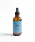 Serenity Essential Oil Room Spray bottle centered on a white background, front label view