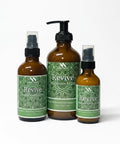 Three Revive Magnesium Lotion bottles - 4oz spray, 8oz pump, and 2oz spray - with green mandala-patterned labels on a white background