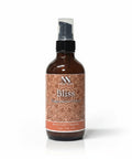 Bliss Magnesium Lotion 4oz pump bottle with orange mandala-patterned label on a white background
