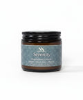 Serenity Magnesium Cream 2oz jar with teal mandala-patterned label on a white background