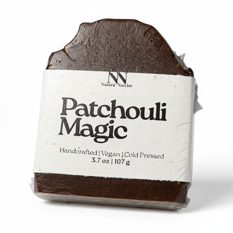 Patchouli Magic Vegan Soap bar wrapped in kraft paper label on a white background