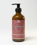 Enchanted Magnesium Lotion 8oz pump bottle with pink mandala-patterned label on a white background