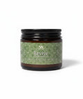 Revive Magnesium Cream 2oz jar with green mandala-patterned label on a white background