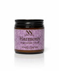 Harmony Magnesium Cream 4oz jar with purple mandala-patterned label on a white background