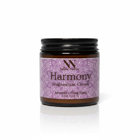 Harmony Magnesium Cream 4oz jar with purple mandala-patterned label on a white background