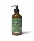 Revive Magnesium Lotion 8oz pump bottle with green mandala-patterned label on a white background