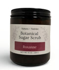 Botanical Sugar Scrub jar in Roxanne scent on a white background