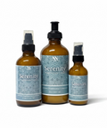 Three Serenity Magnesium Lotion bottles - 4oz spray, 8oz pump, and 2oz spray - with teal mandala-patterned labels on a white background